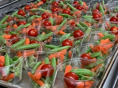 Veggies in clear cups for students