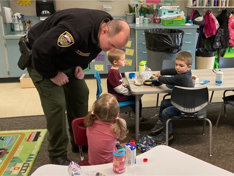KCSO Corporal Houseberg speaks to a student 