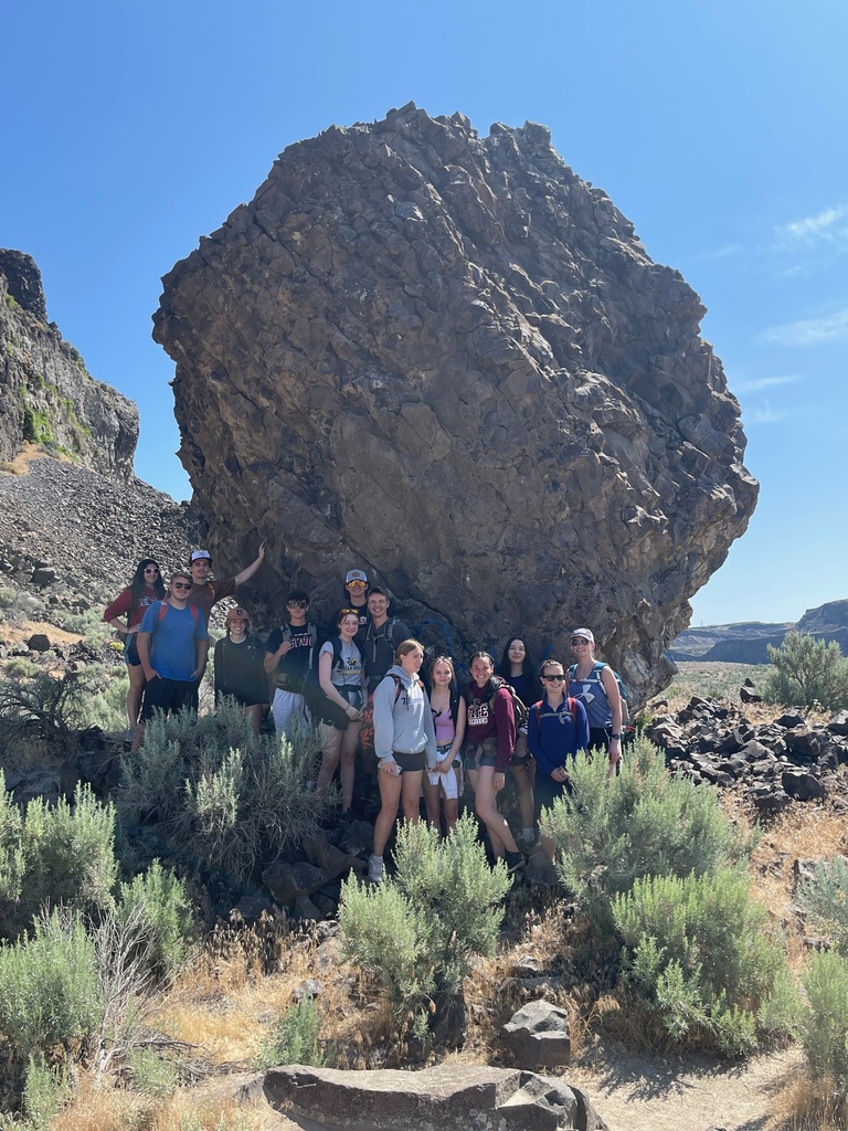 Seniors with a big rock 